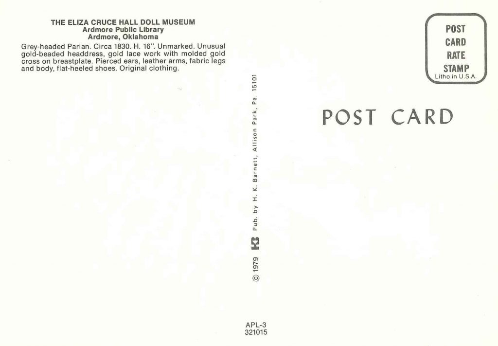 Back of postcard describing the Parian doll